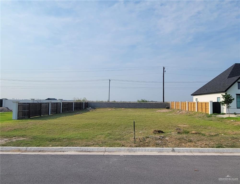 a view of a house with a big yard