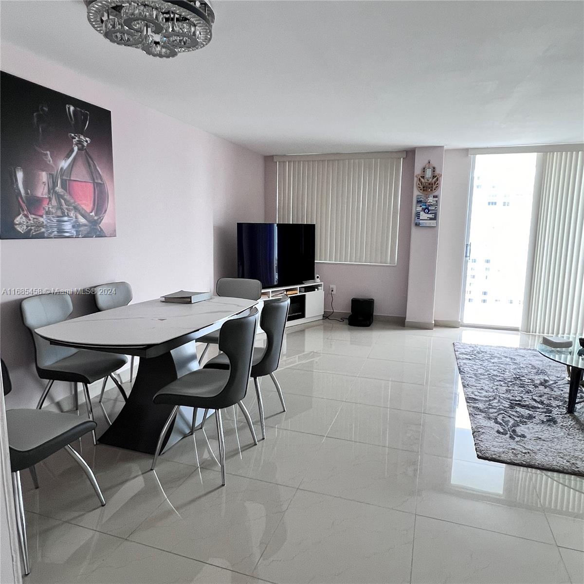 a view of a livingroom with furniture and a rug