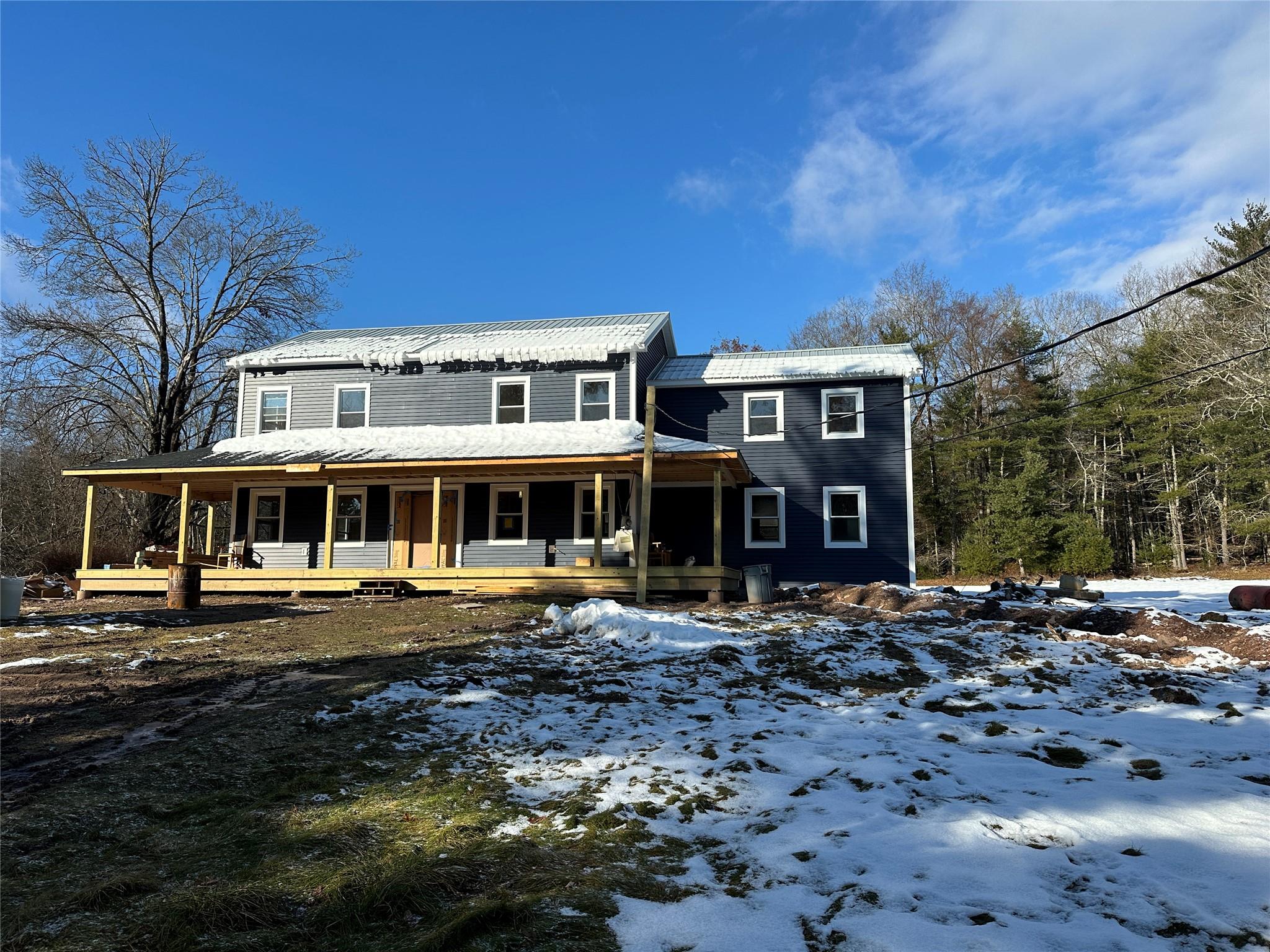 View of front of property featuring a porch