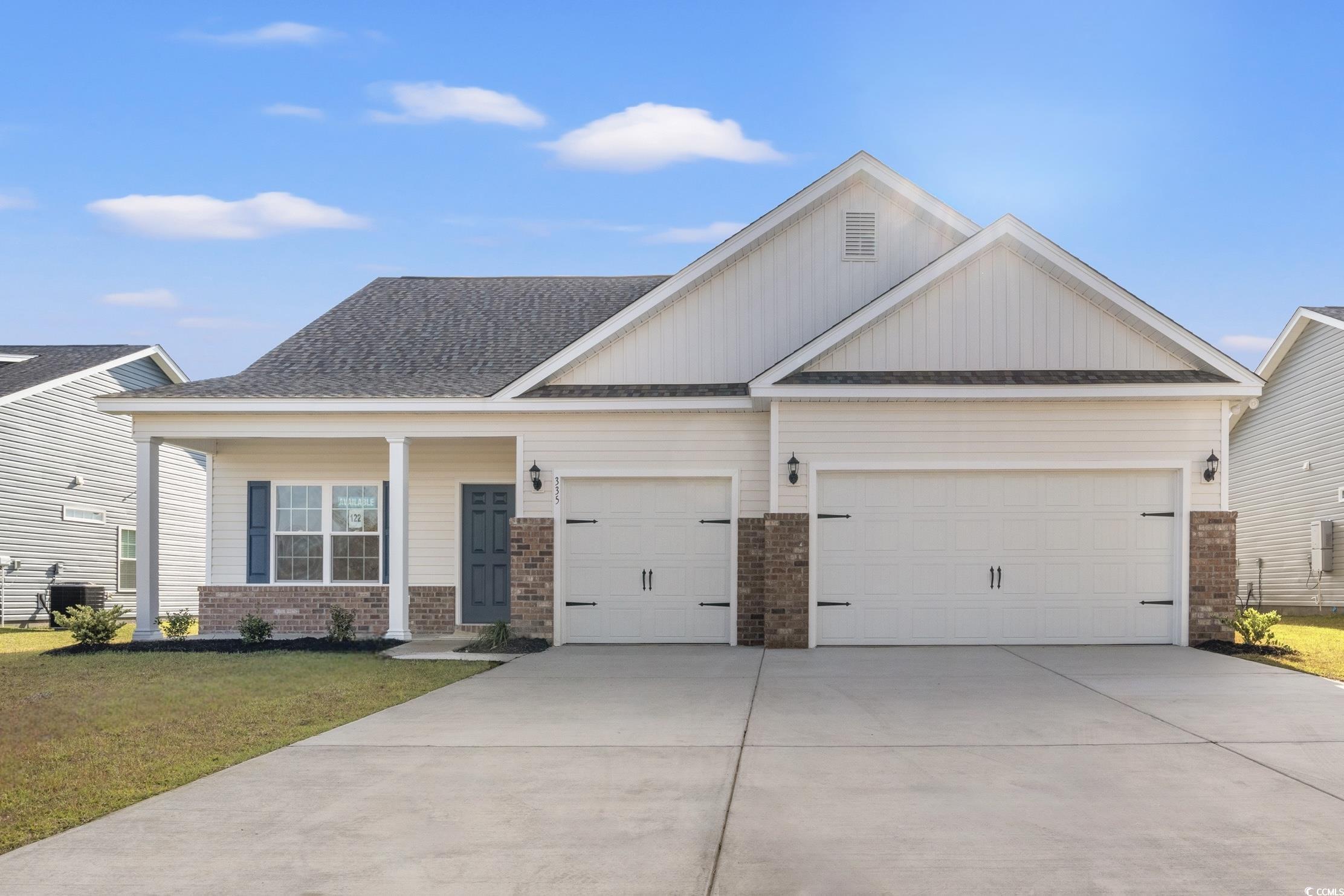 Craftsman-style home with a front yard, a porch, a