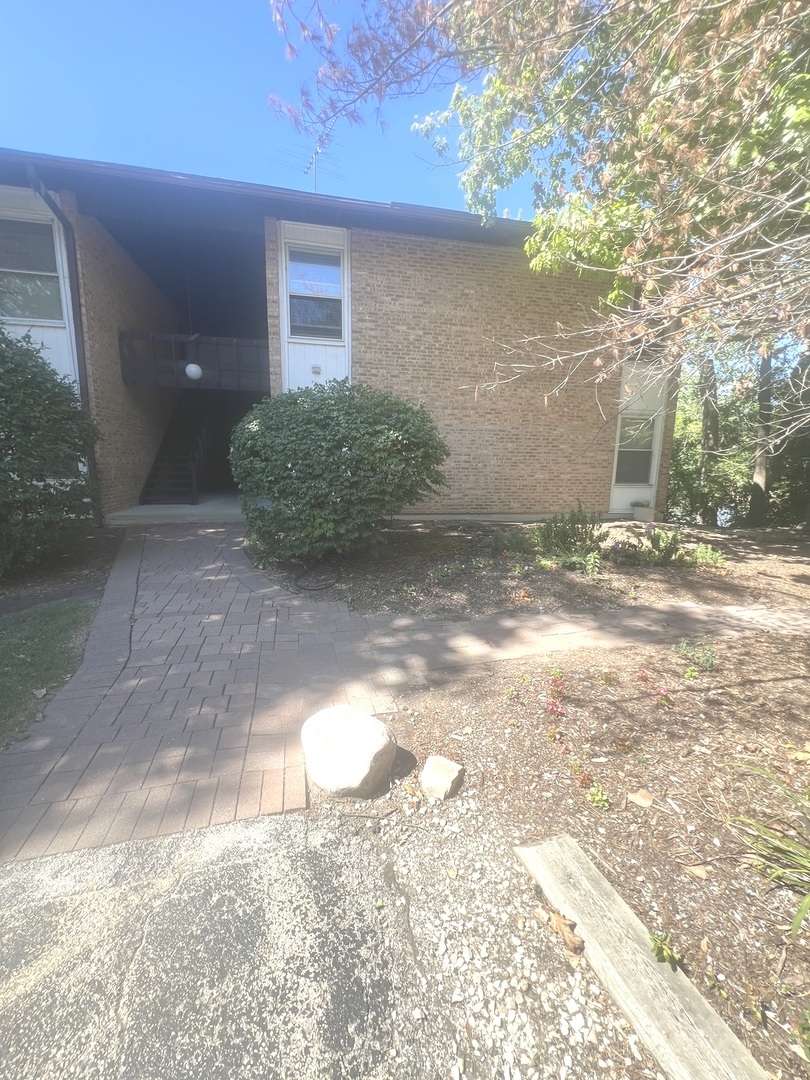 a view of a backyard of the house