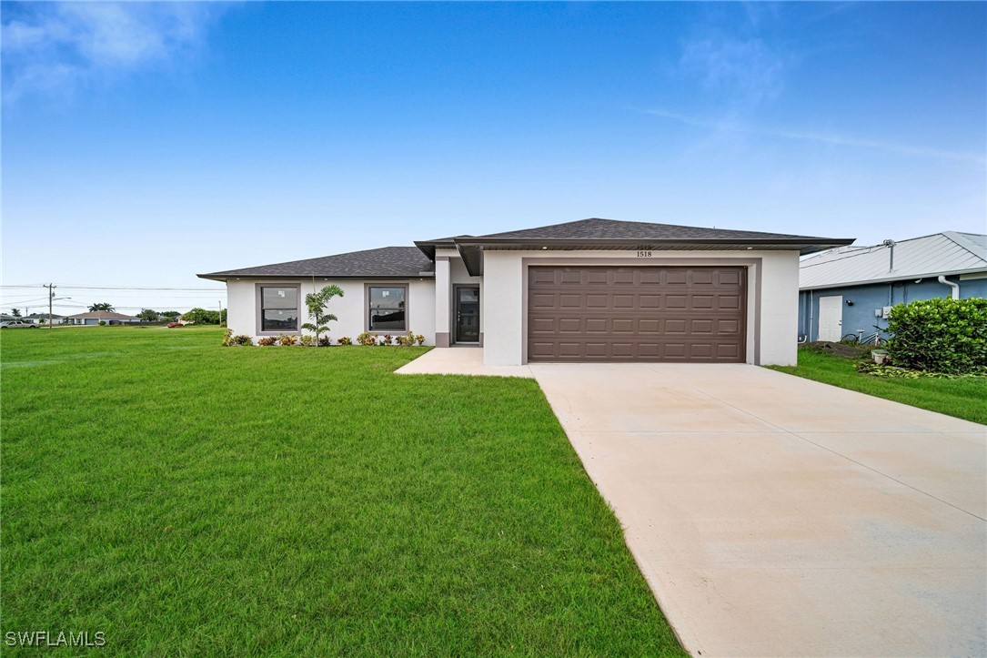 a front view of house with yard