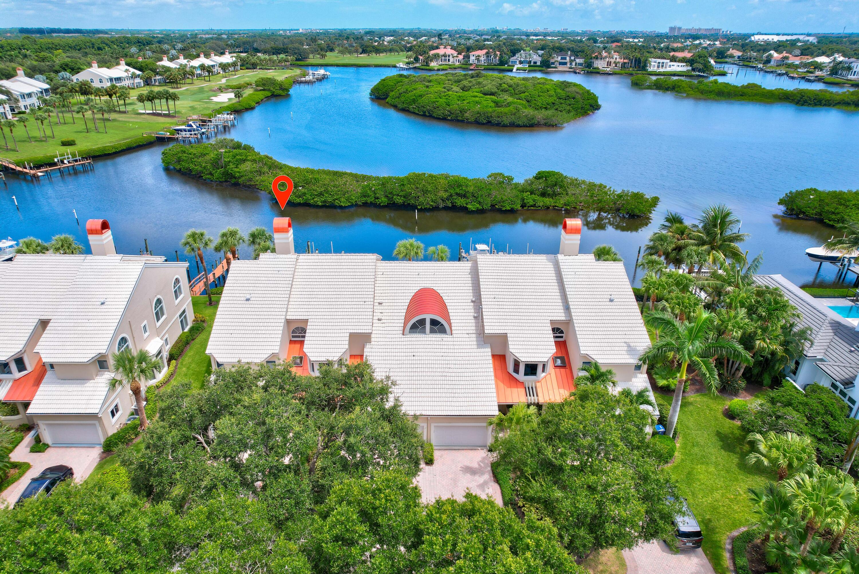 an aerial view of house with yard swimming pool and outdoor seating