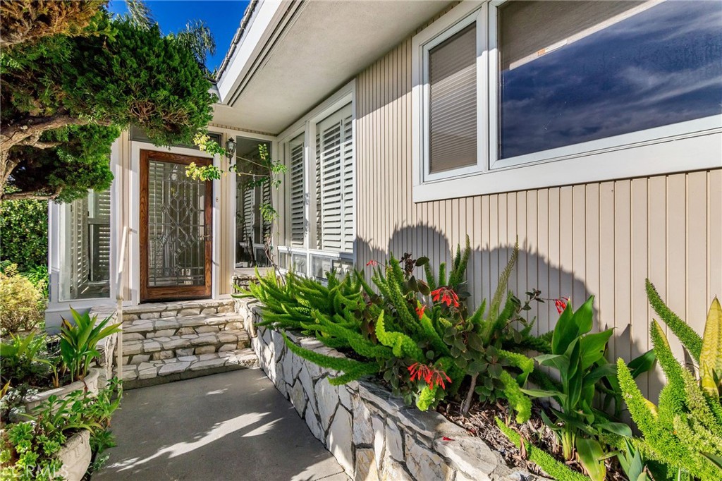 a house with a flower garden