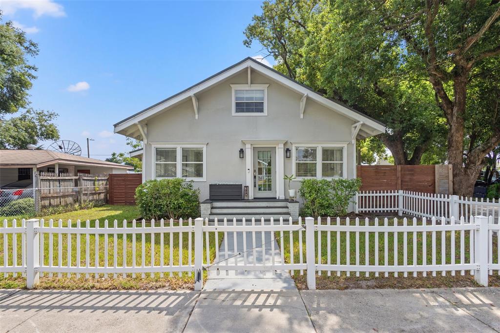 a front view of a house with a porch