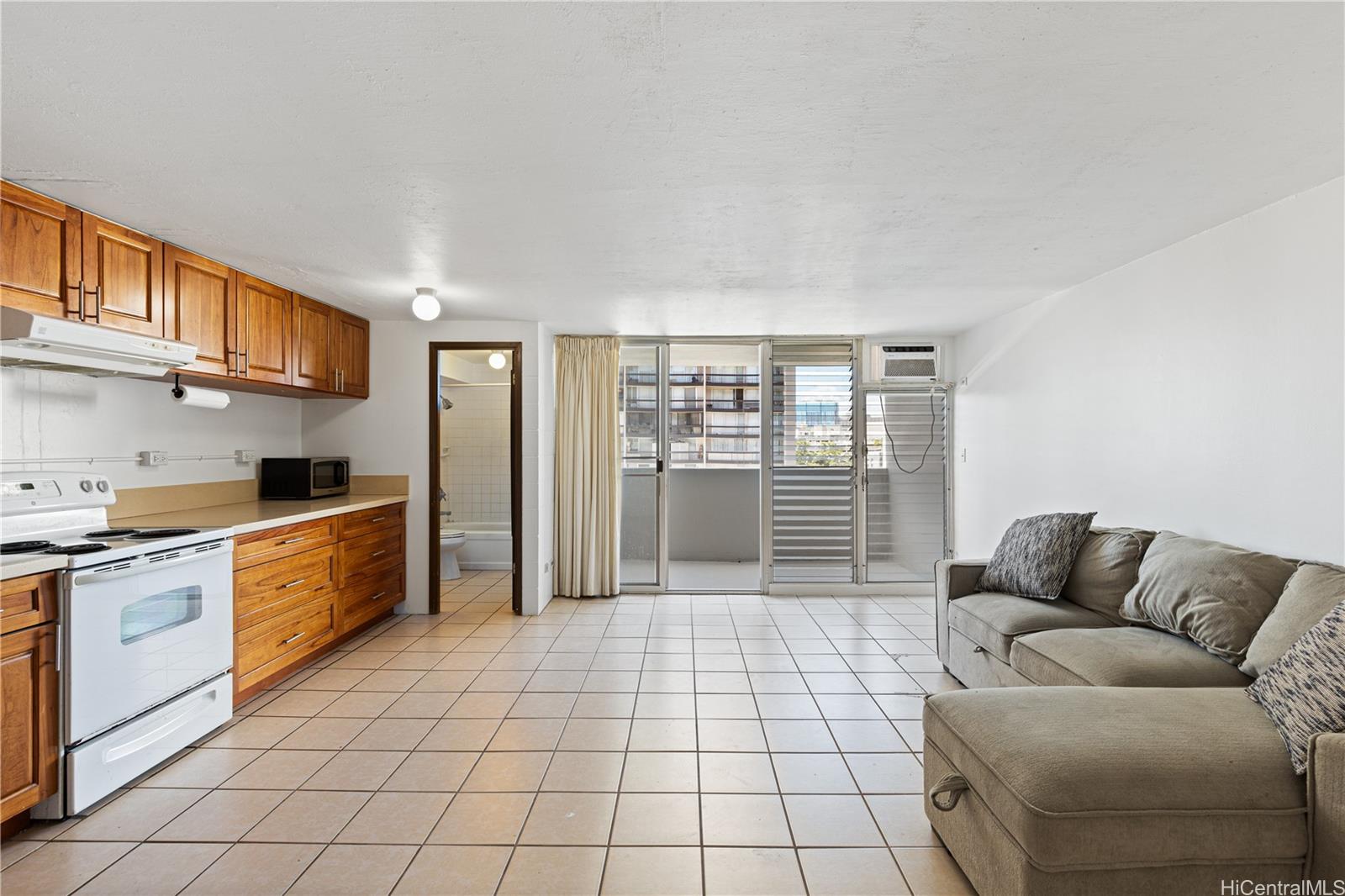 a kitchen with stainless steel appliances a refrigerator sink and cabinets