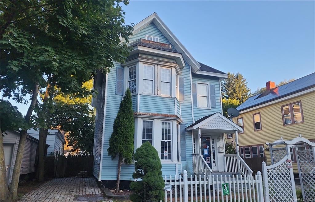 a front view of a house with porch