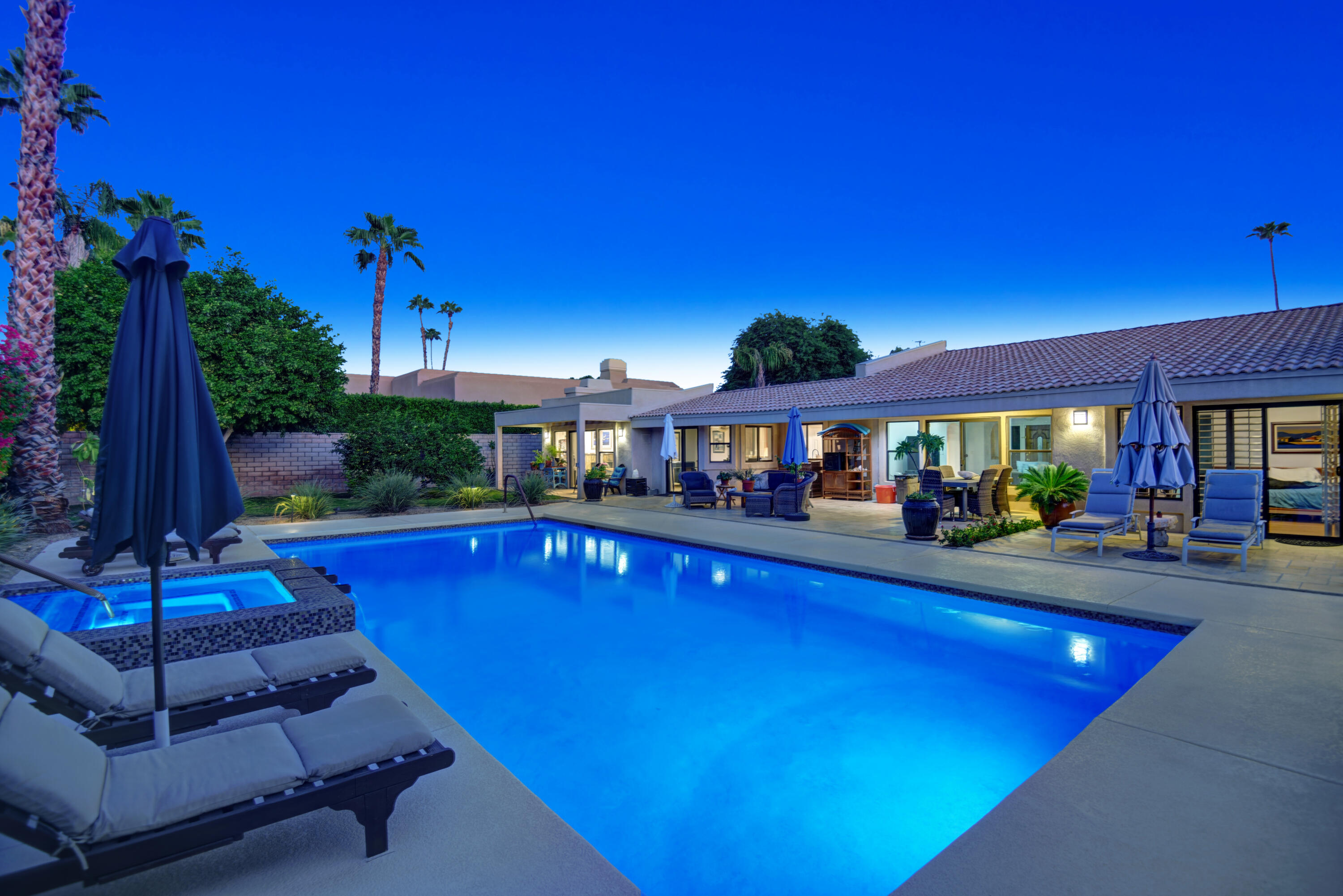 a view of a swimming pool with a patio