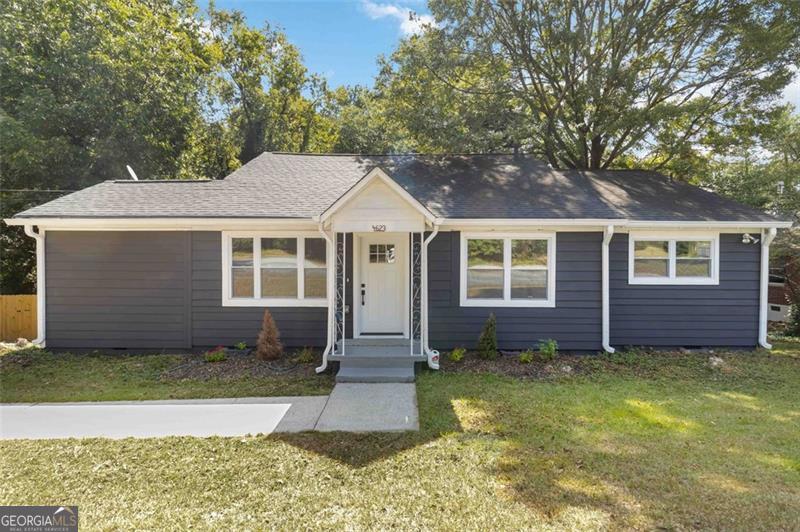 front view of a house and a yard