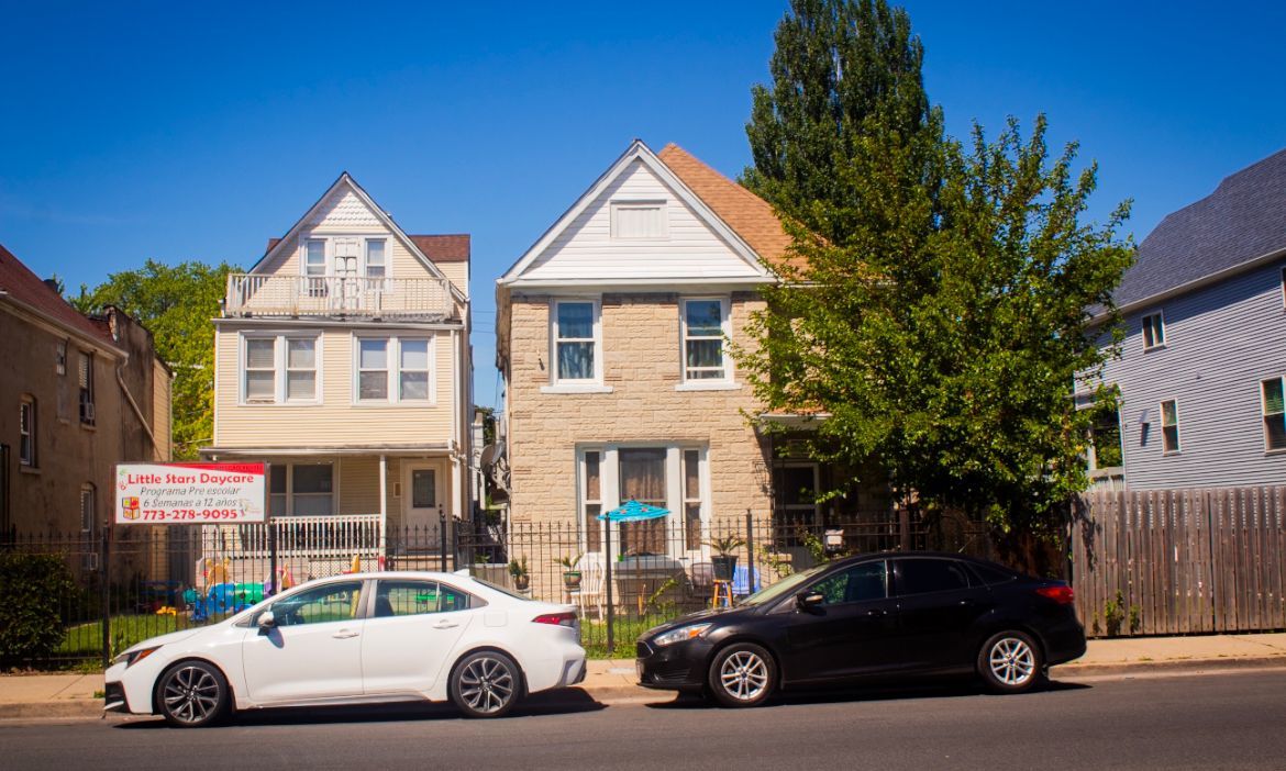 a car parked in front of a house