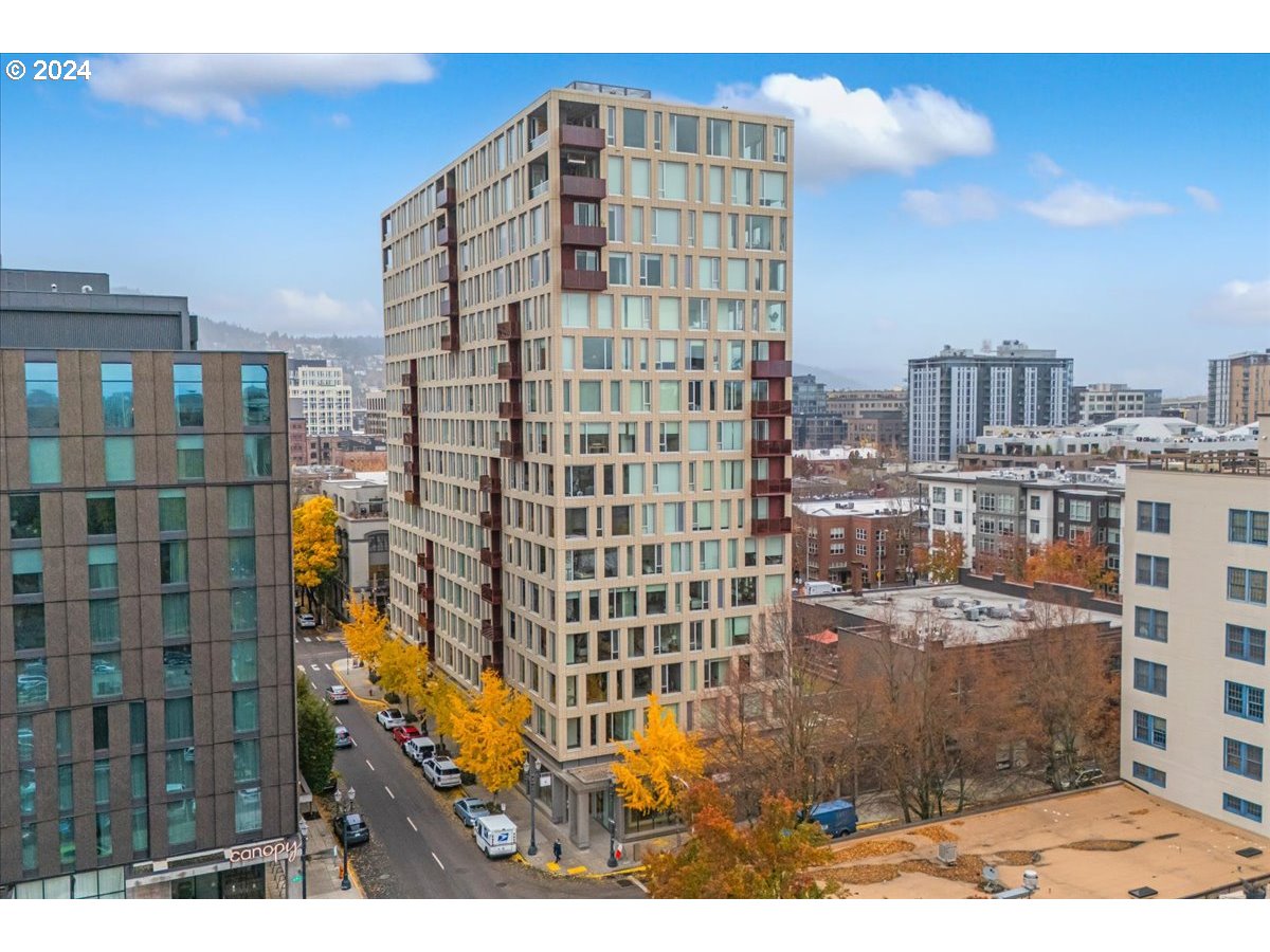 a view of a city with tall buildings