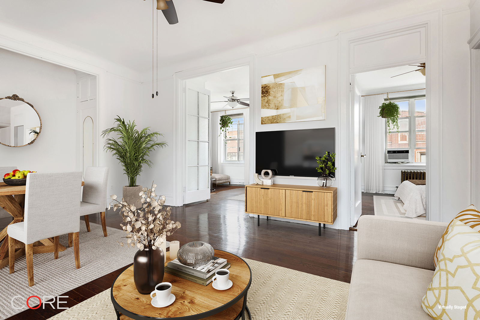 a living room with furniture and a flat screen tv