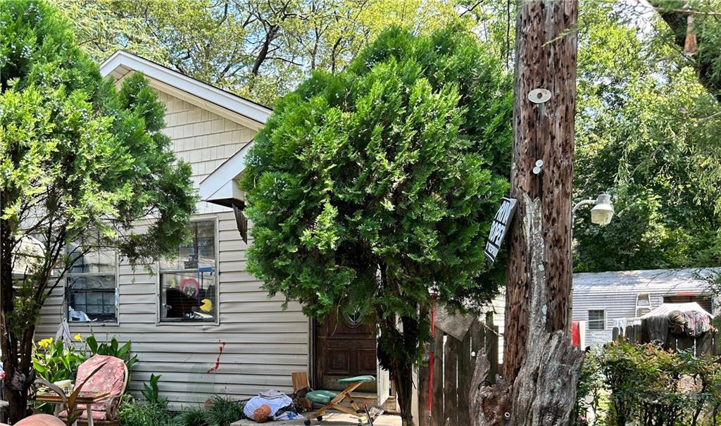 a backyard of a house with lots of green space