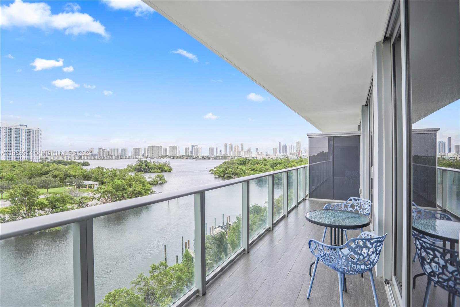 a view of a balcony with chairs