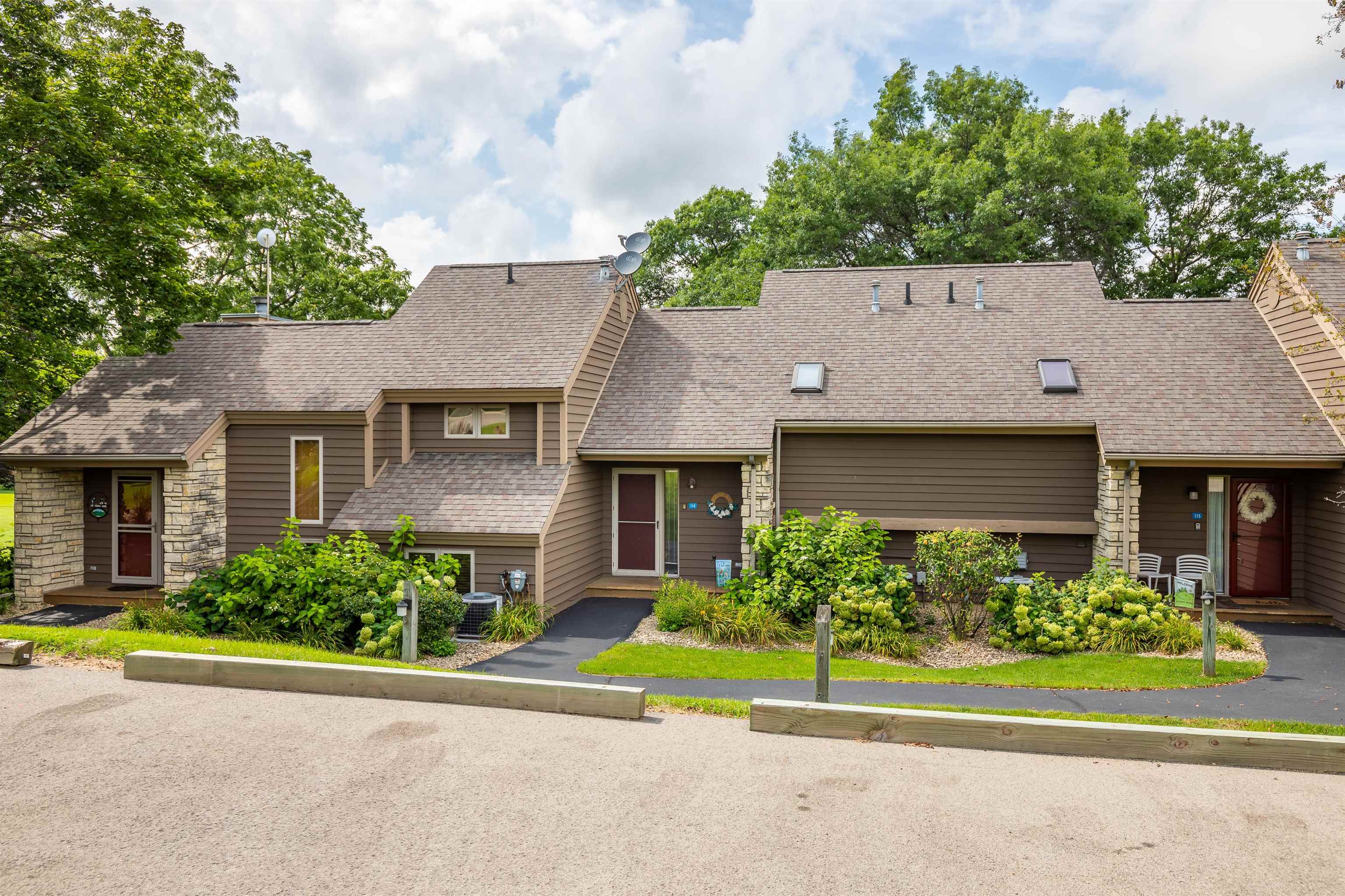 front view of a house with a small yard