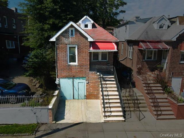 View of front of home with a garage