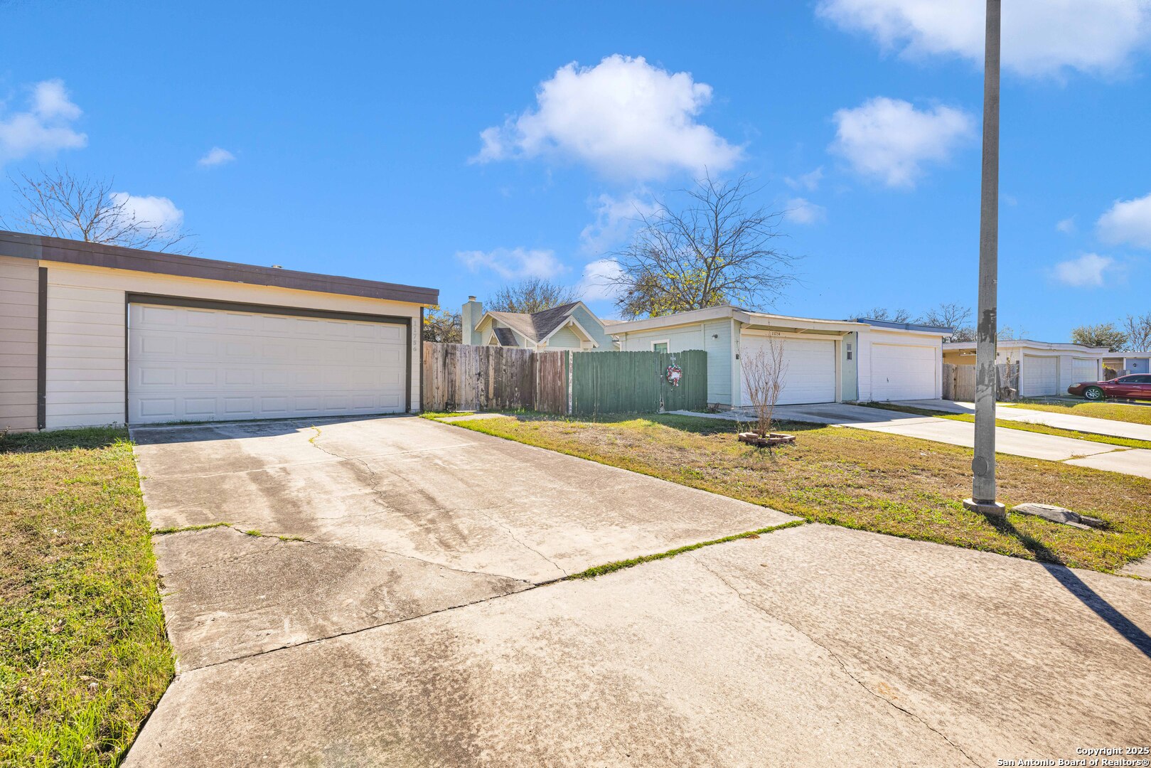 a house view with a backyard space