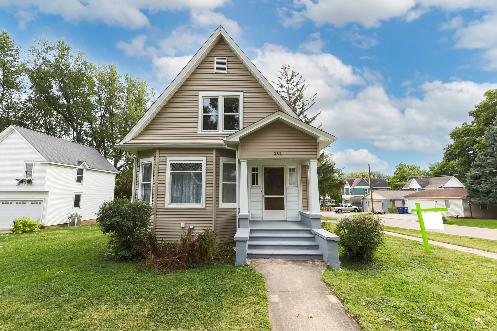 a view of a house with a yard