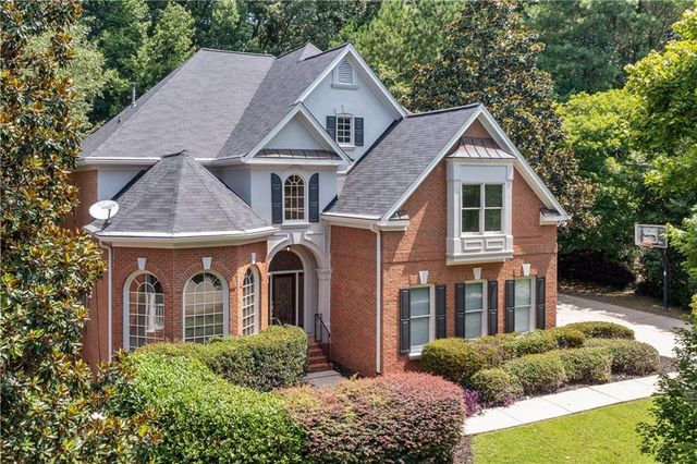 $1,050,000 | 4567 Brigade Court Northeast | Garrison Oaks