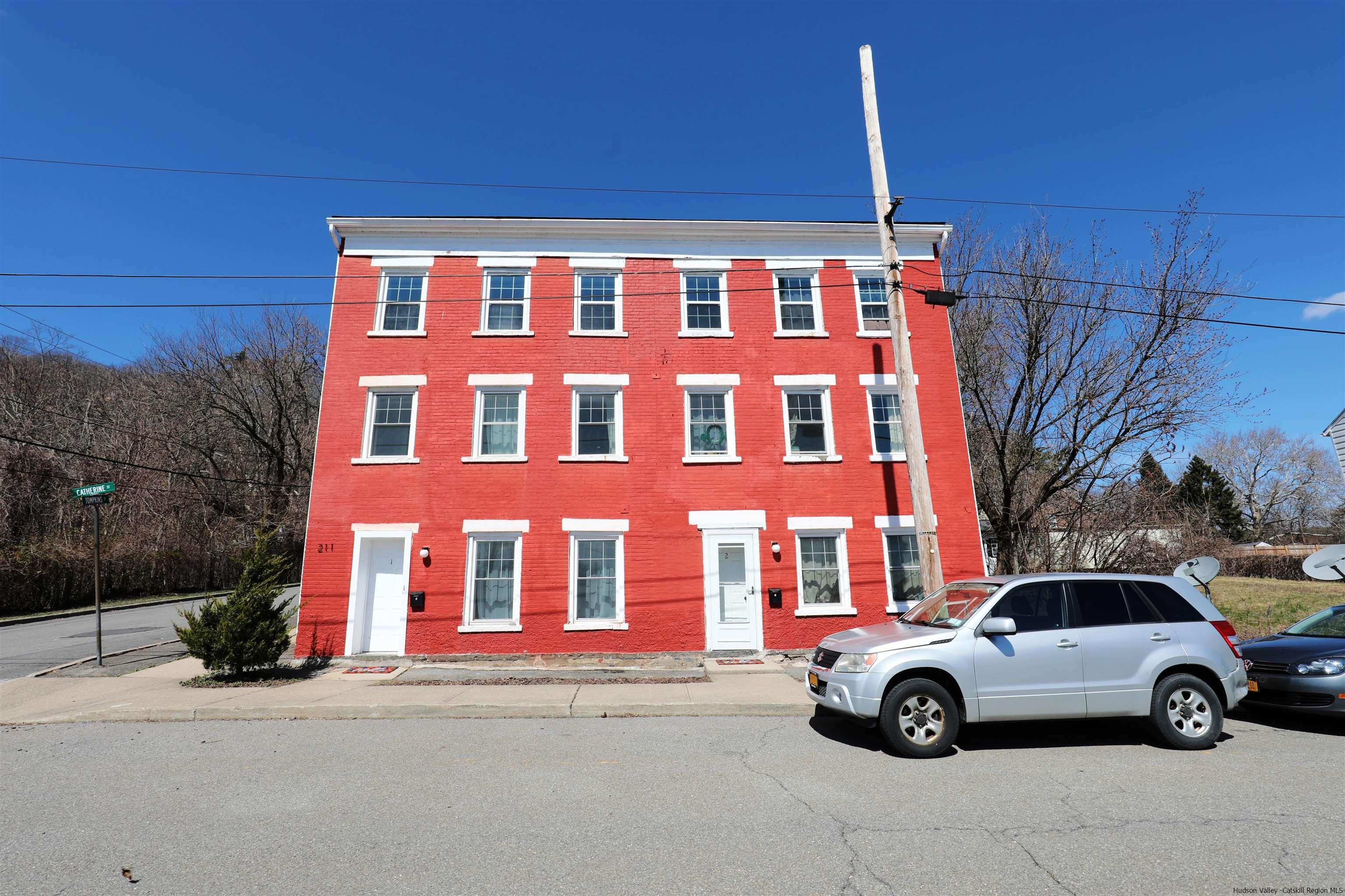 front view of building with parking space