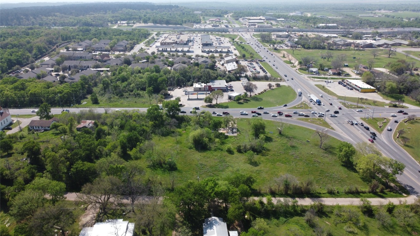 an aerial view of a city with lots of residential buildings