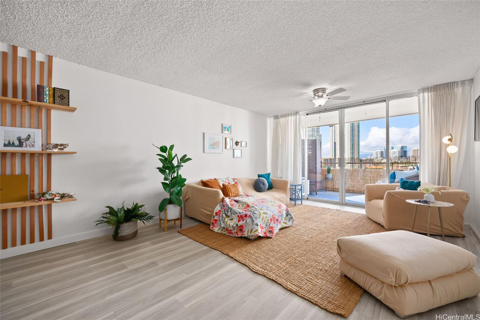 a bedroom with furniture and a wooden floor