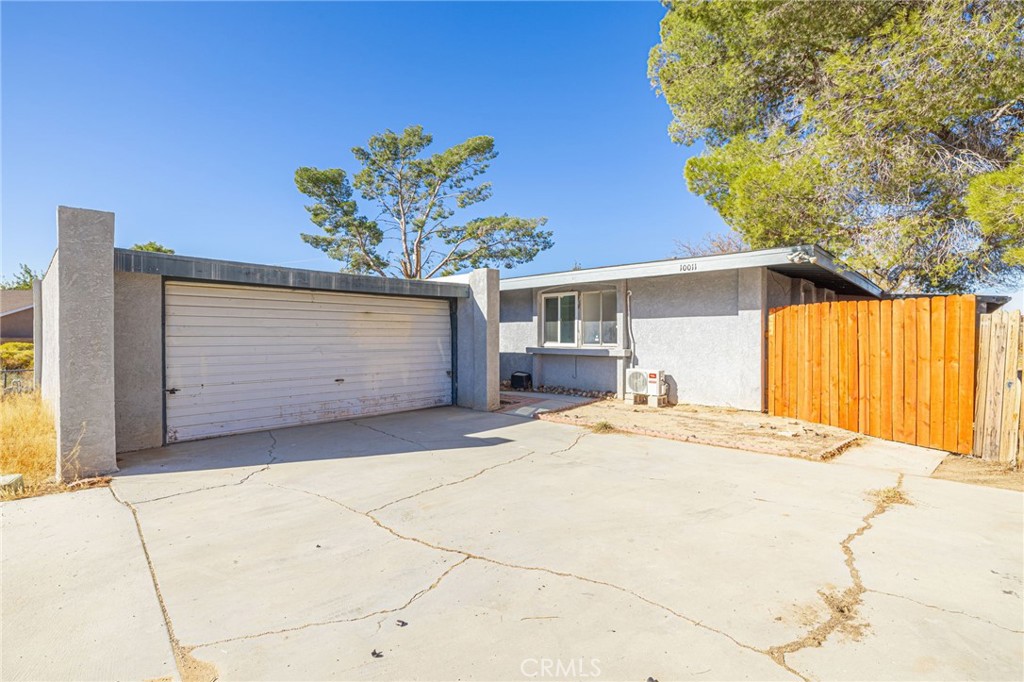 a view of backyard of a house