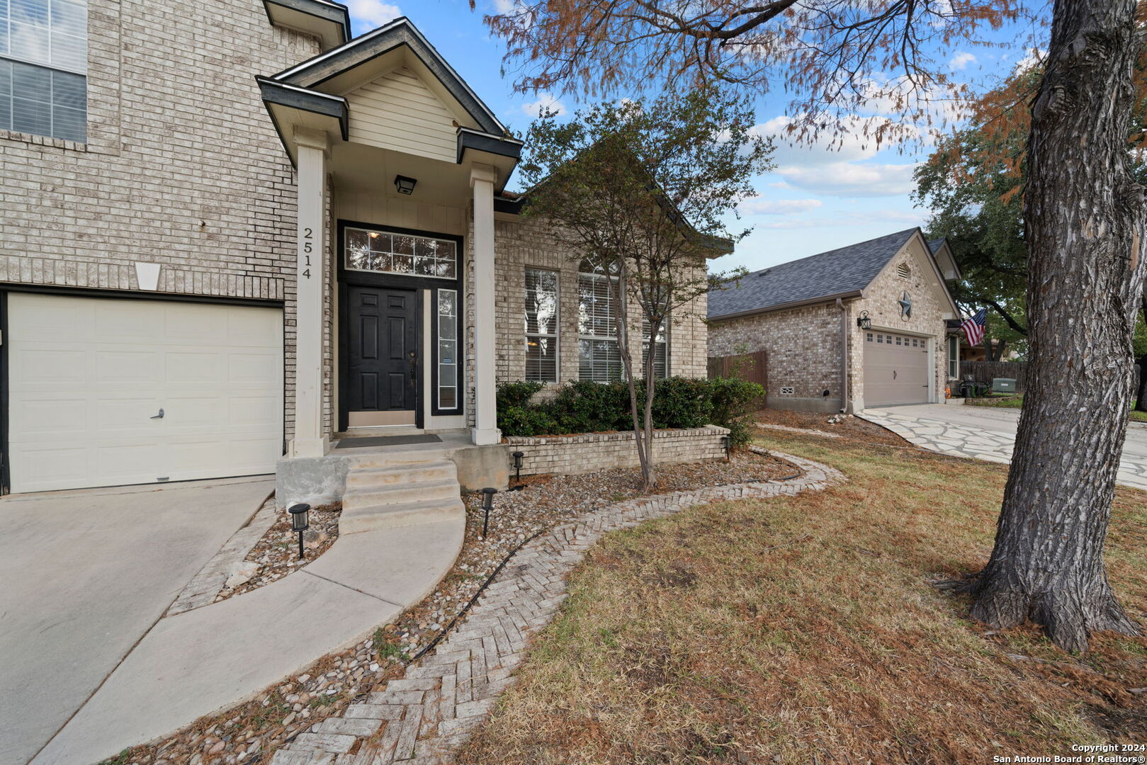 a house view with a outdoor space