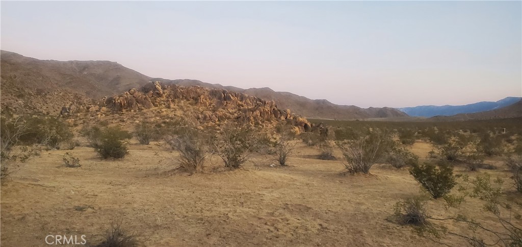 a view of outdoor space and mountain view