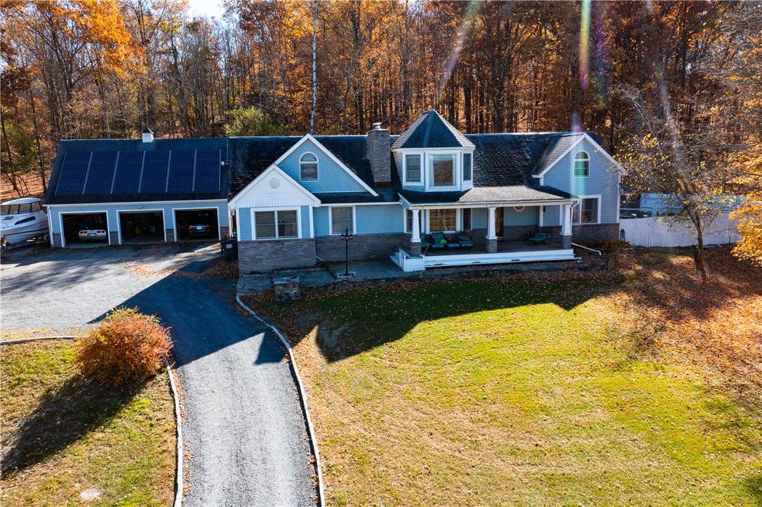 View of front of home featuring a front lawn