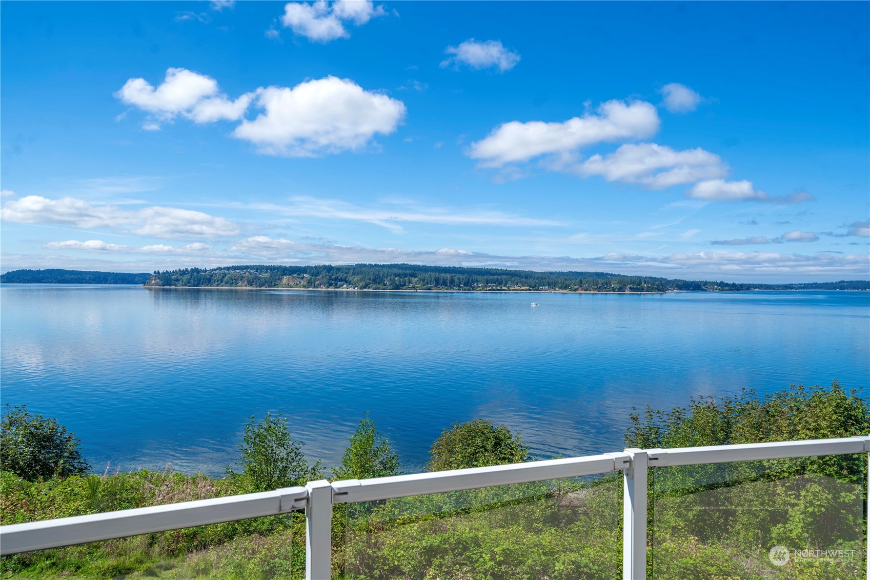 a view of a lake from a balcony