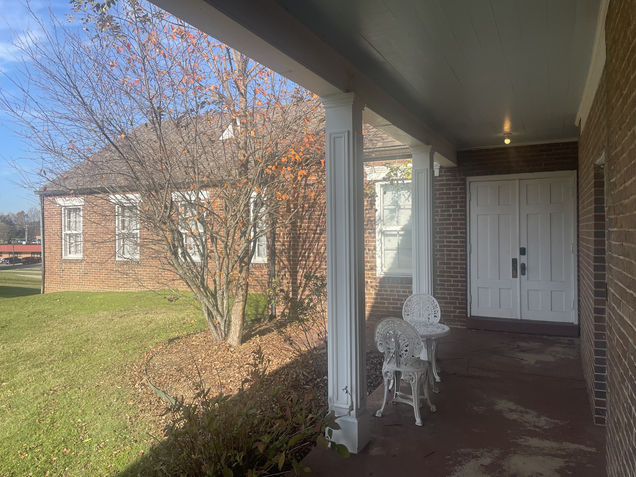 a front view of a house with a yard