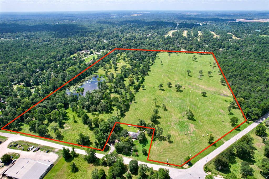 an aerial view of a golf course with a garden