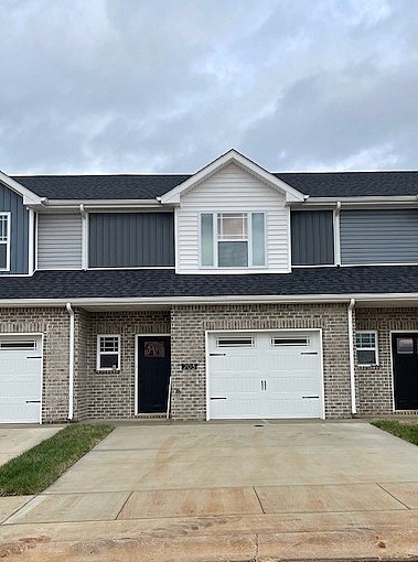 front view of a house with a garage