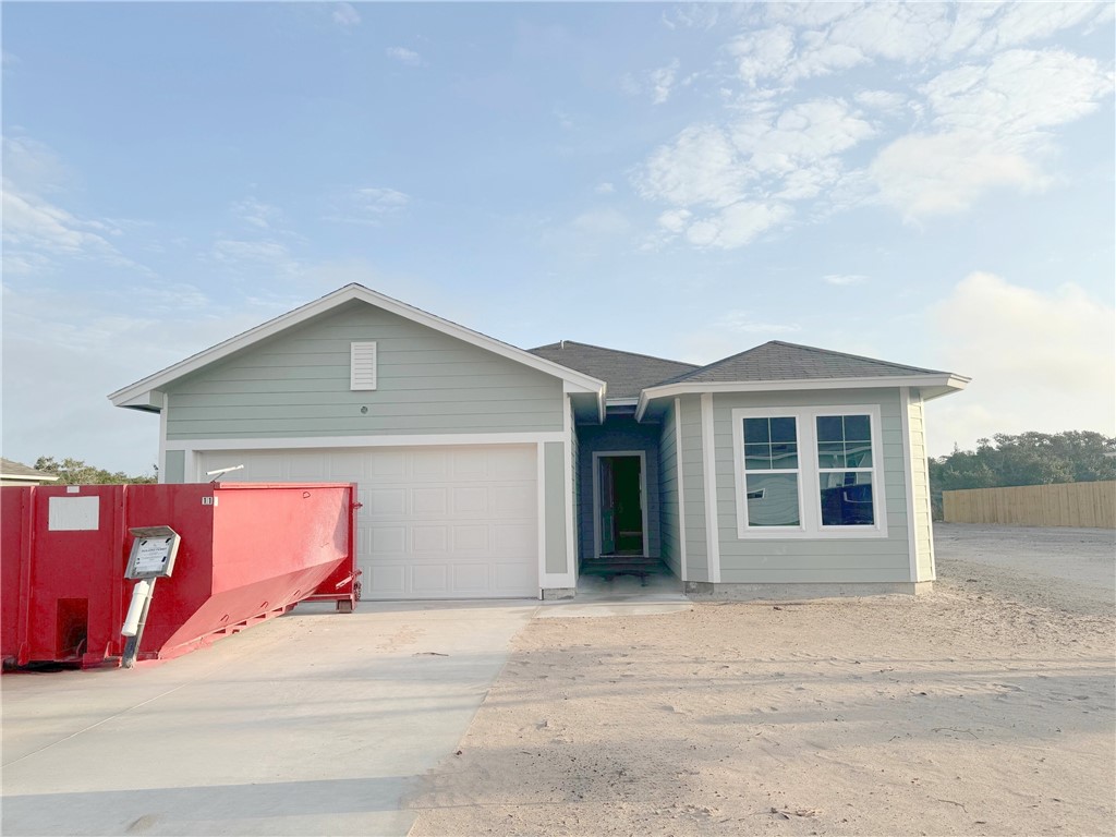 a view of outdoor space yard and garage