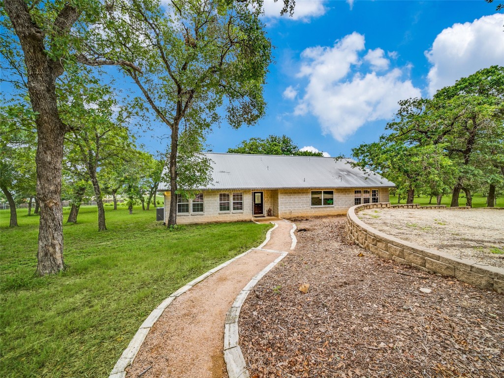 front view of a house with a yard