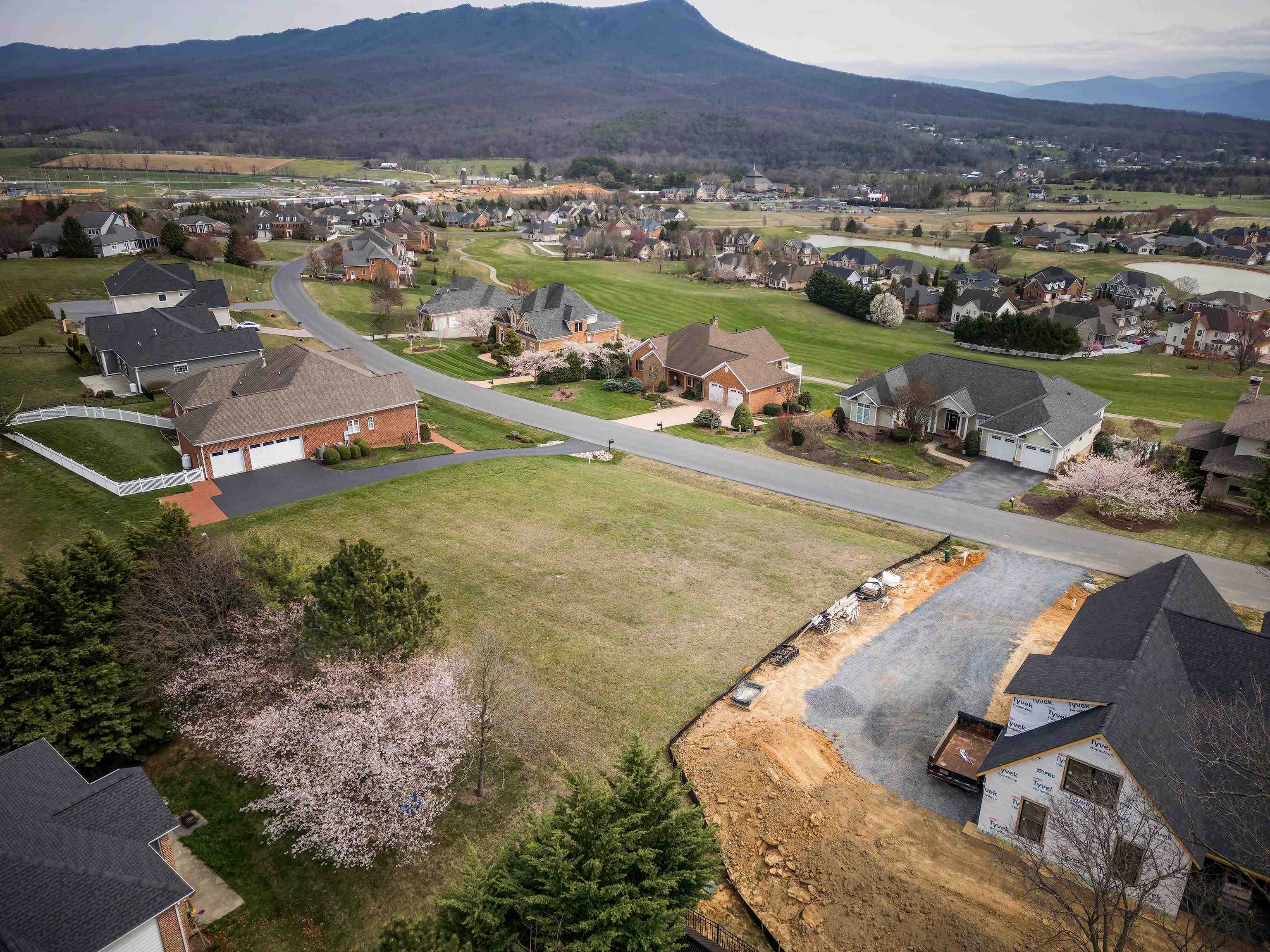 an aerial view of a house with a garden