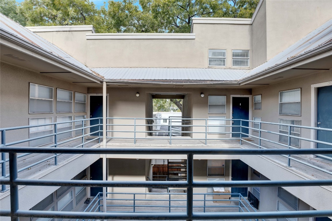 a view of a building from a balcony