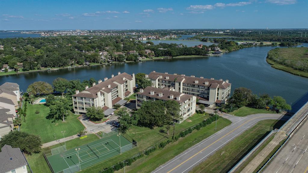 Discover waterfront living at The Point at Egret Bay Condos, nestled on the serene banks of Clear Creek.