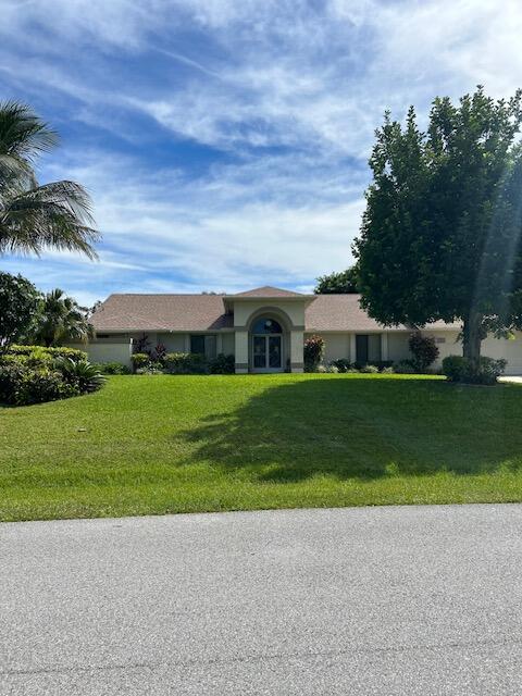 a front view of house with yard