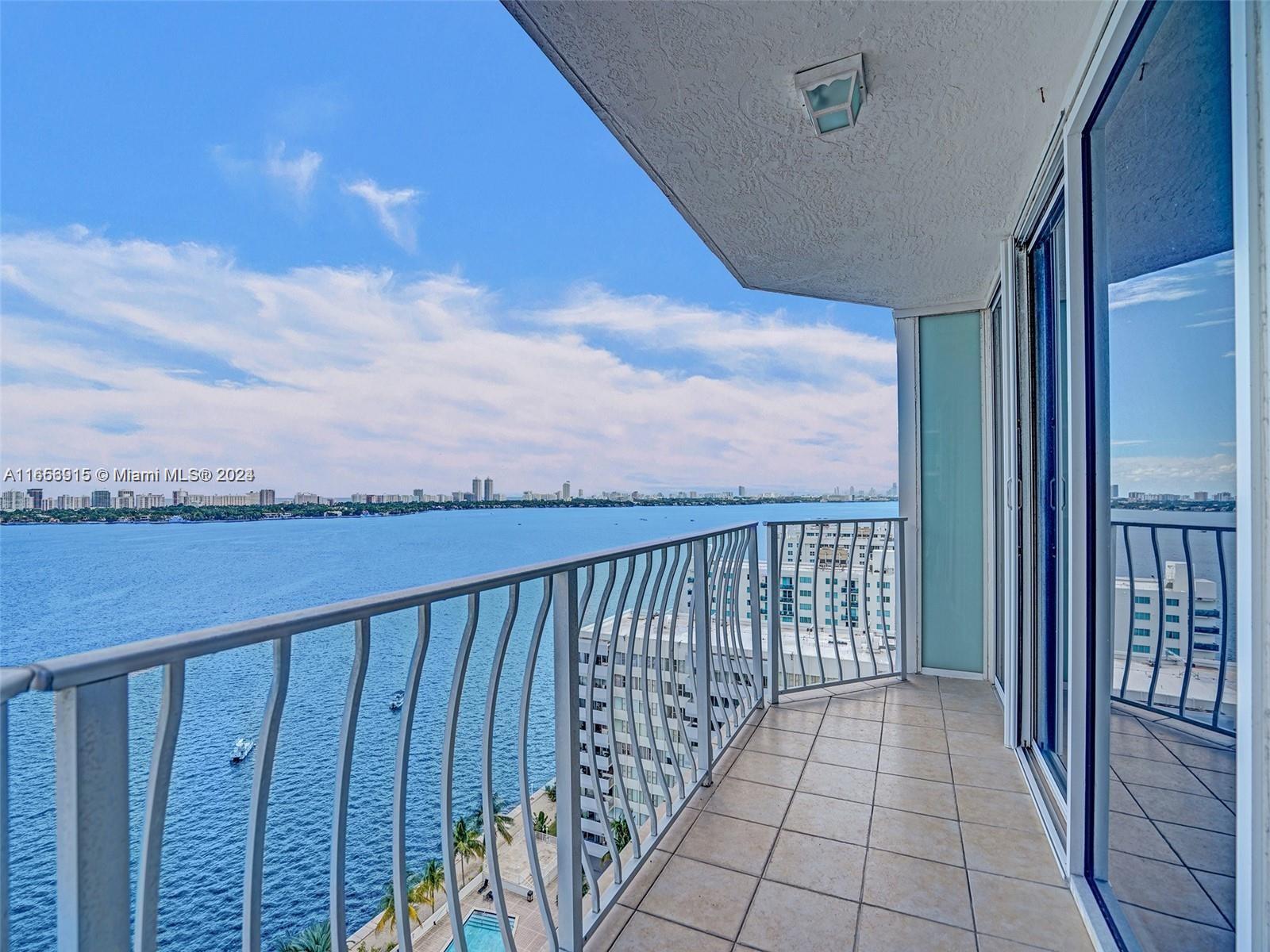 a balcony with an outdoor space