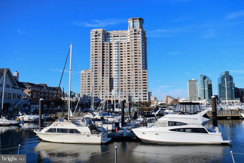 a view of water with tall building