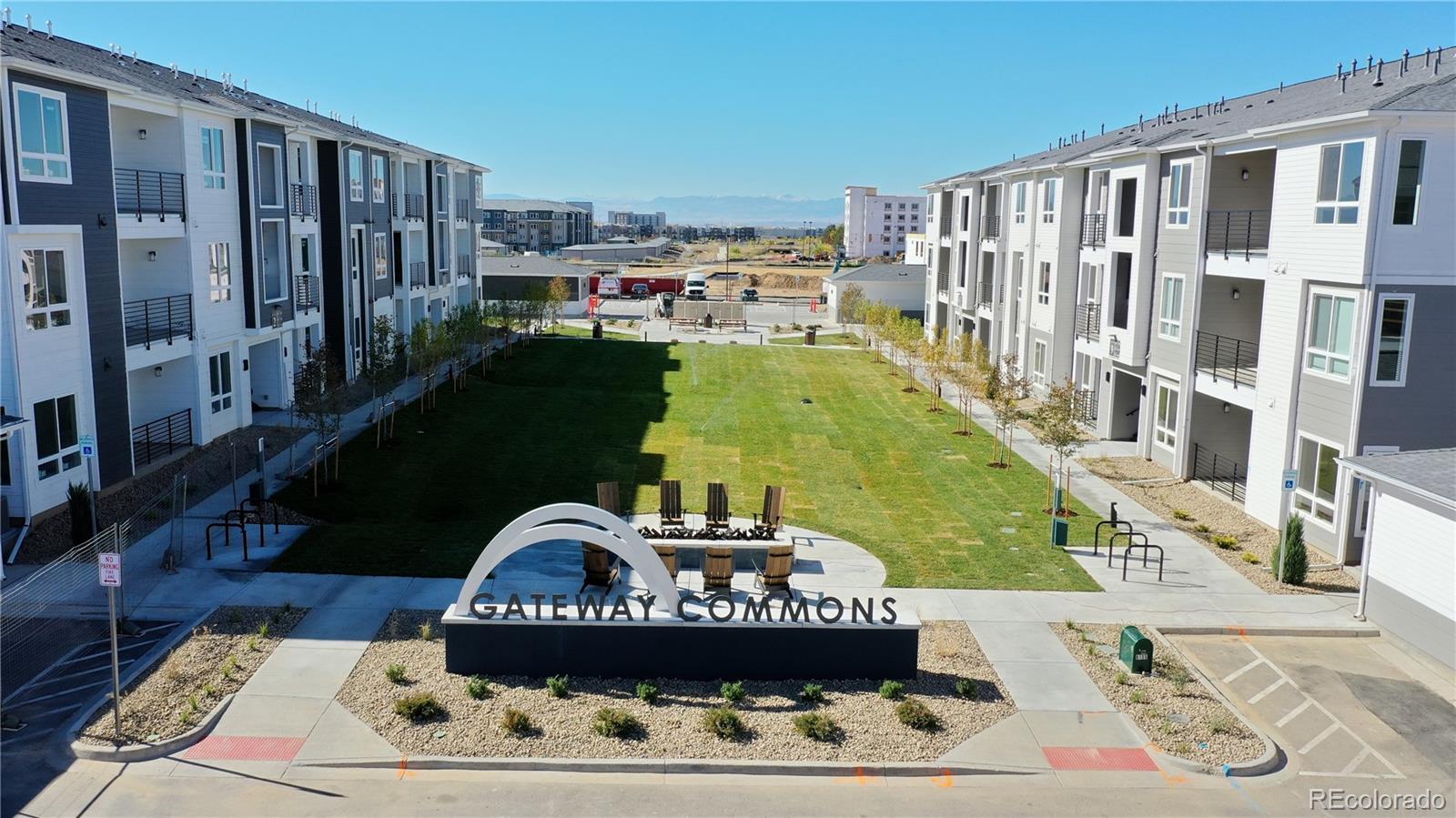 a view of a balcony next to a yard