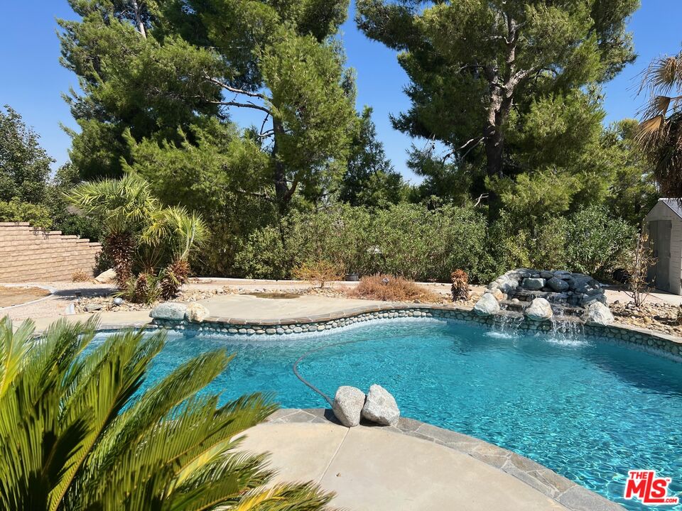 a view of a swimming pool and lake