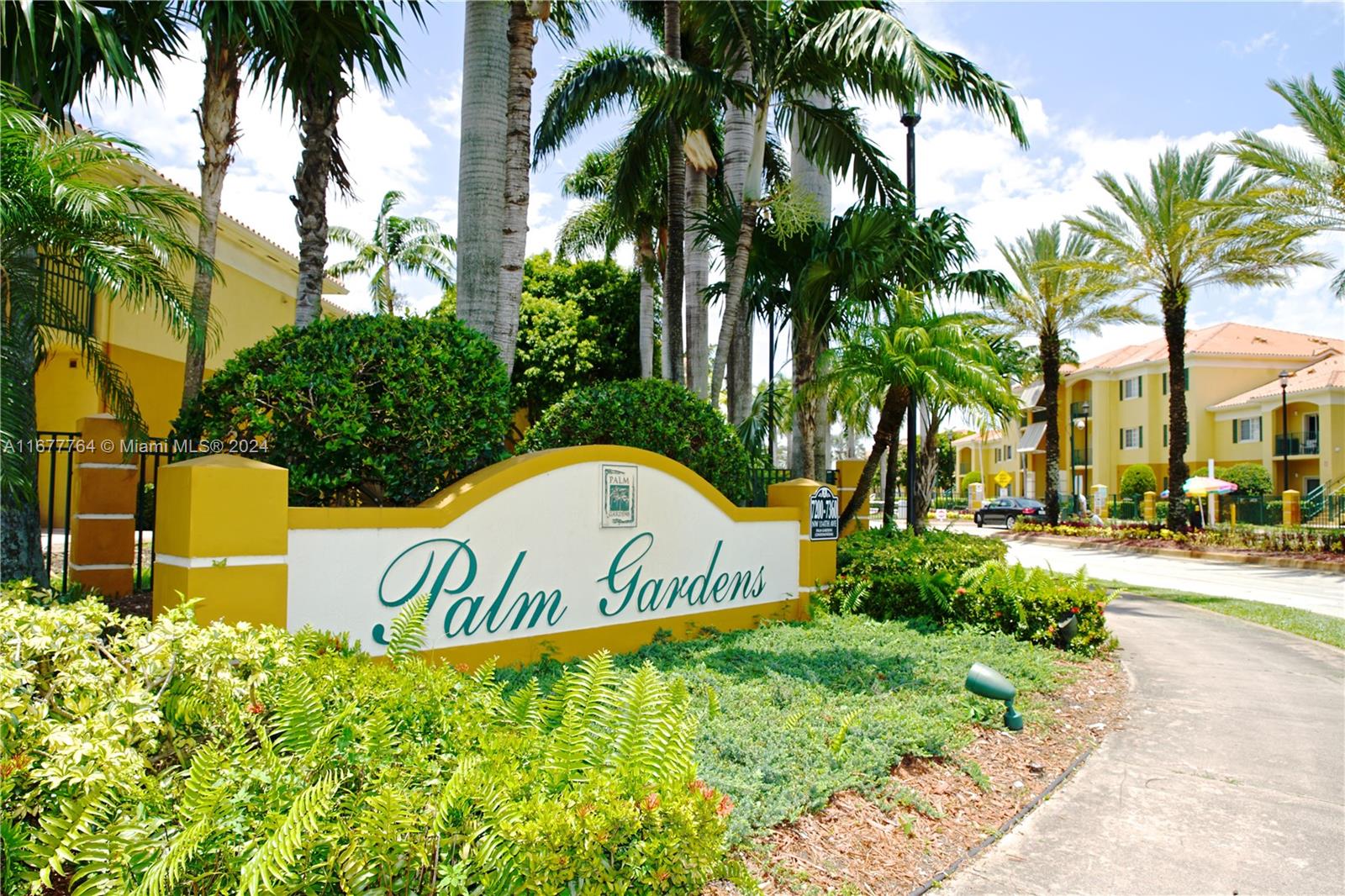 a sign board with palm trees