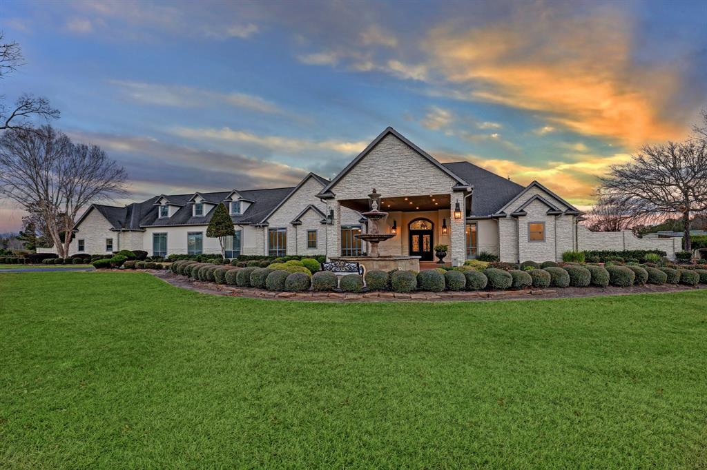 Elegant Main Entrance with Manicured Gardens