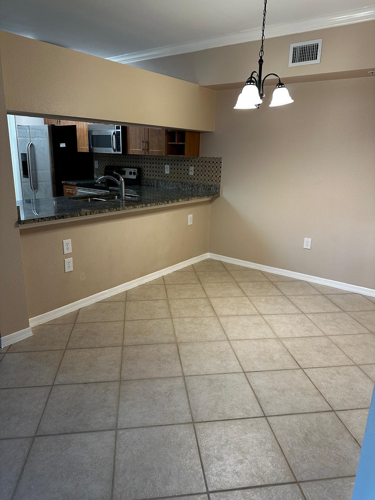 a view of a kitchen with a sink