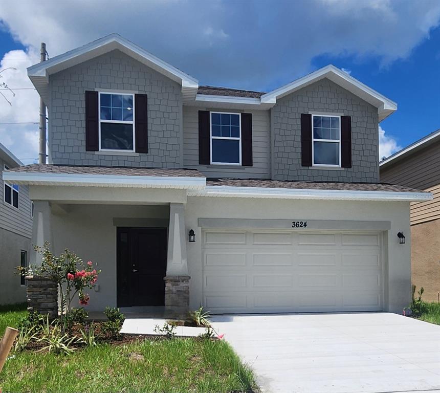 a front view of house with yard