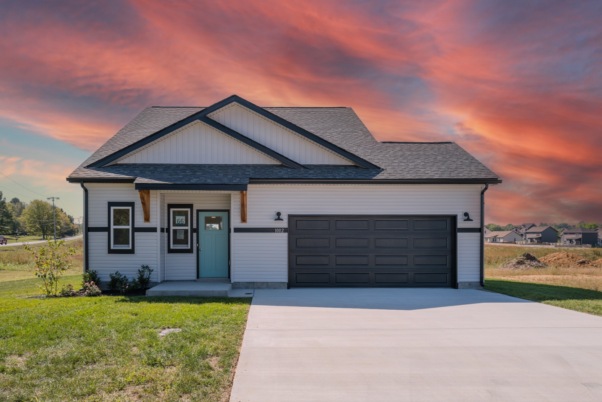 front view of a house with a yard