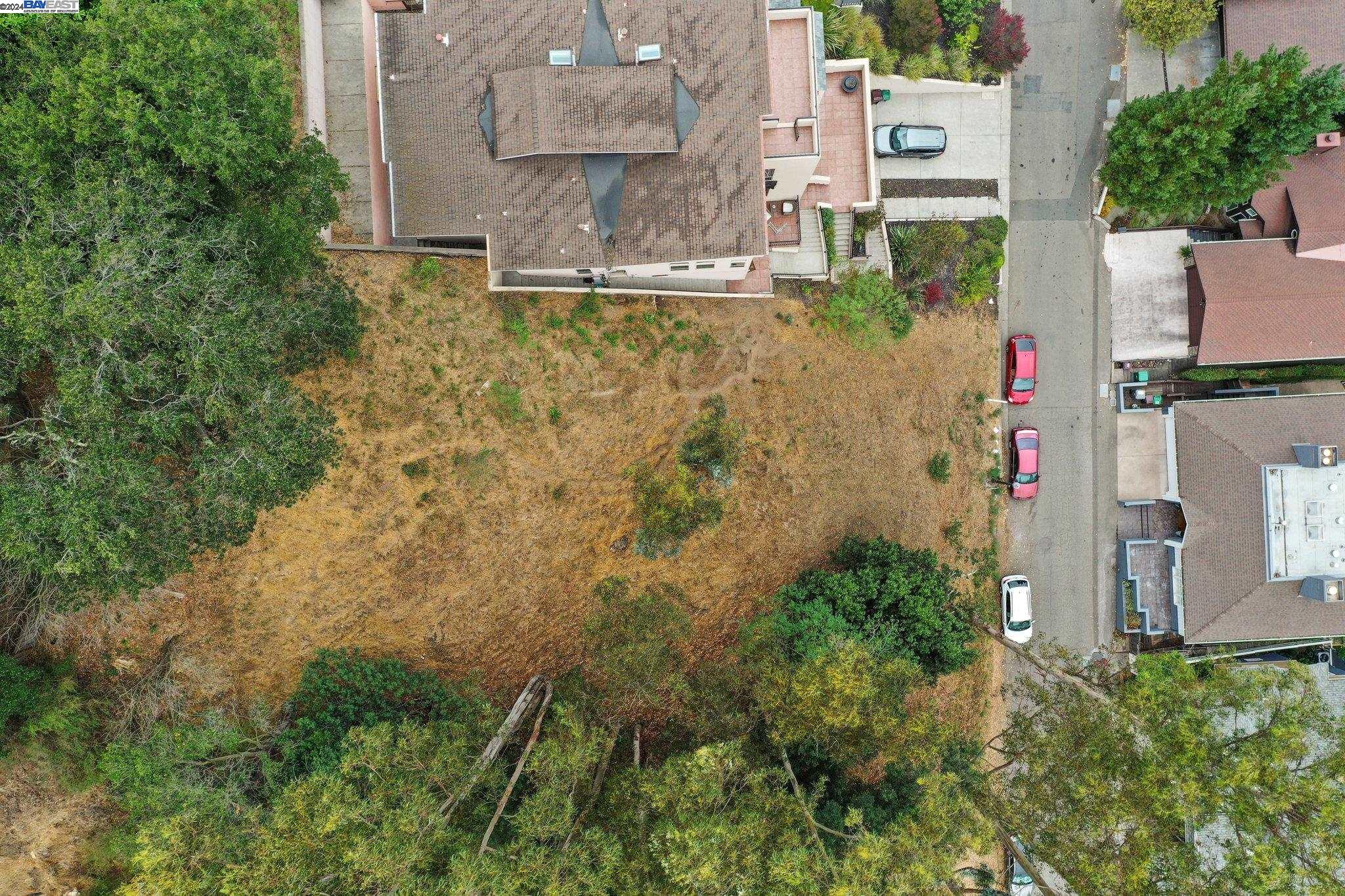 an aerial view of residential house with outdoor space